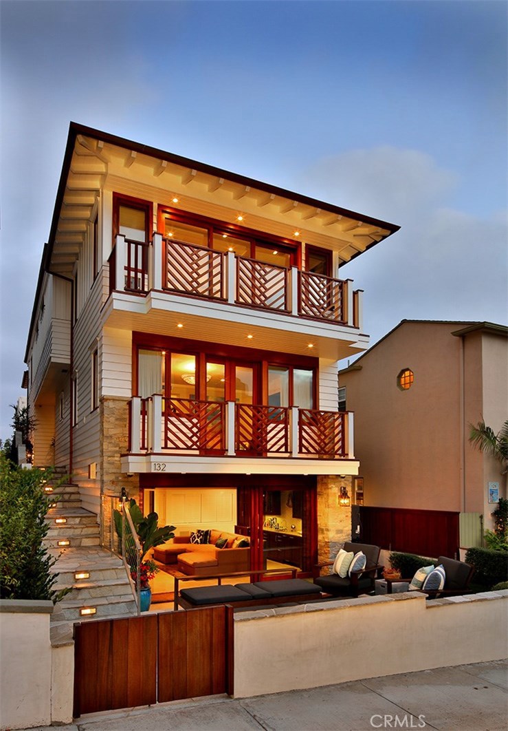 Not often does a property come along that has it all, but there is no denying that 132 16th Street has it all and more! From being perfectly positioned on a prime walkstreet, literally steps to the Pacific Ocean and minutes to downtown Manhattan Beach to it’s sleek, timeless design, this home is the epitome of Southern California beach living. The sophisticated design by renowned local architect Louie Tomaro incorporates coastal elements that seamlessly blend the interior with the exterior spaces. Brought to life and newly built by Moloney Development, this custom home offers jaw-dropping ocean, sunset & whitewater views south to Catalina and all the way north to Malibu. Warm wood elements, modern lines, and exquisite top of the line finishes provide a feeling of luxury and comfort in this 4 bedroom, 4.5 bath, 4,100 esf. home. Impressive amenities include a gourmet Chef’s kitchen, home office with custom built-ins, 3-stop elevator, media room with full bar, entertainment deck with BBQ and outdoor kitchen, 4 fireplaces, fully integrated Savant audio/video system, Lutron automated window shades, one touch lighting and 4-car parking!