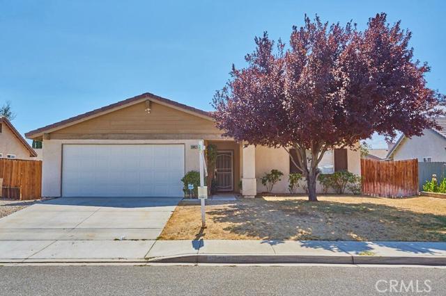 Fantastic Opportunity to own a Single Family home in Victorville! This single story home built in 1999 and boasts 3 bedrooms, 2 bathrooms, 1233 sq.ft., RV Access and has an Attached 2 Car Garage. Greeted by Beautiful laminate wood flooring sprawling throughout the living areas connecting the open layout concept flooded with natural light. Step into the kitchen equipped with gorgeous Granite countertops, stainless steel appliances, recessed lighting, and tons of cabinet space! Spacious Dining Area and Living Room make a great space for entertaining family and friends. The master suite features striking granite countertops with dual sinks and spacious closet. Enjoy the Huge backyard with a breezy patio, RV Access and tons of space for BBQ and all of your toys! View this Turn-Key Home Today! Association Amenities: None # of RV Spaces: 0NONE Lot Location Type: Standard Location Special Features: None # of Attached Spaces: 2 # of Detached Spaces: 0