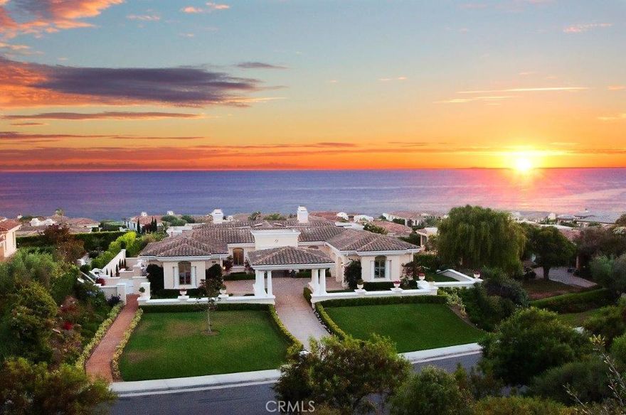 We are proud to introduce this superior Mediterranean custom home with endless ocean & Catalina views, located in the prestigious multi-million dollar neighborhood of Oceanfront Estates on the Palos Verdes Peninsula. Approx. 7900 sq. ft. on a half acre+  lot, 5 Bedrooms with en-suite bathrooms, & a master retreat w/ office, sitting area, & ocean-view balcony. The dramatic porte-cochère entry welcomes you to this marvelous estate featuring DR, LR, Huge Family Room, hardwood floors, custom moldings, large gourmet kitchen w/ ocean-view eating area adjoining a 800SF patio w/FP, perfect for entertaining and enjoying sunsets. This home is the perfect place to host hundreds or just a few for an intimate dinner party. With a well thought out plan to have guests enter through a side entrance, or down the stairs from the large deck off the first floor, the beautifully landscaped yard features an outside kitchen w/ built in BBQ & Frig, 4 fountains, fireplace, veranda, and patios for family and friends to enjoy! The home exudes comfort and sea side living for any and every occasion. Extra Large Living area downstairs w/ a custom 18 seat home theater, 80” TV, full bar, a gym, and stand-by generator. This home has an elevator and is completely wheelchair accessible!