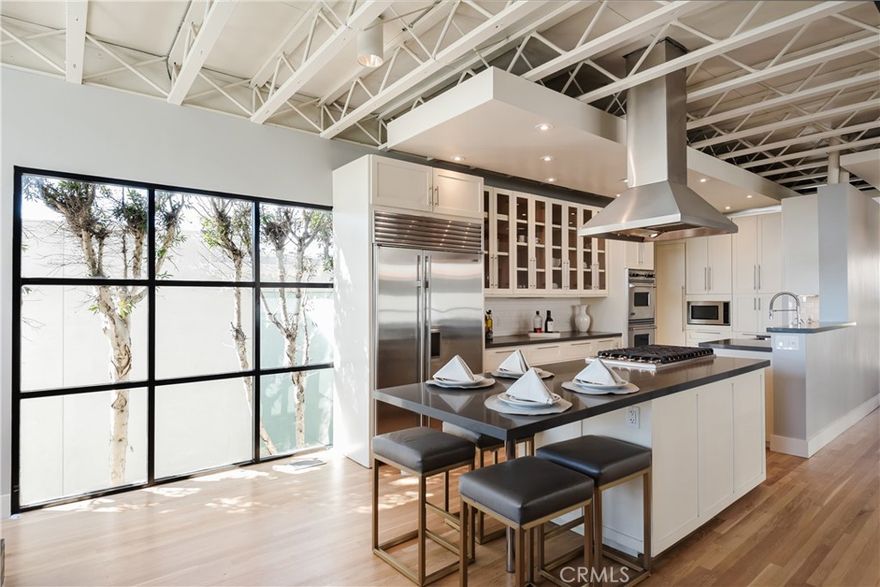 One of the most desirable WALKSTREETS in MB! This modern stunner just completed a beautiful remodel, yet still capturing its  unqiue cool Venice vibes with unblock_able ocean VIEWS! An open layout w/high ceilings, massive deck off living space that offers an incredible oversized firepit / seating area along with room for full size dinnig table to enjoy dinner with your views. Boasting 4 bedrooms ( could be 5 if needed) and 4 bath ,this 2700 sqft home (which includes a 500sqft attached studio w/separate entrance can be incorprated into main house if needed) is one block from downtown and stones throw to the sand! Viking & Sub Zero appliances, 3 fireplaces, new flooring, all brand new beautiful bathrooms, wired for AC , new Hot water tank the list goes on! Dont miss this opportunity to live on walkstreet West of highland for under 6M!