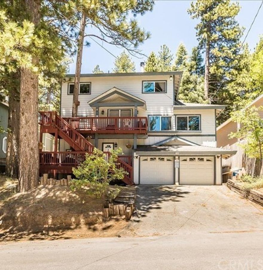 A property you'll appreciate, perfect for a large family! This amazing mountain home features 6 bedrooms, 3 full bathrooms. The open bright kitchen is complete with granite counter tops, travertine tile floor, deep double sinks, and plenty of cabinet space. The master bathroom features large soaking tub, tile with mosaic inlay and his and hers sinks with granite counter top. Additional features include weather resistant dual paned windows, carpet and wood flooring. Backyard newly re done and offers amazing hangout area with a deck, grass area and totally fenced for kids and animals. 3rd floor you'll find 4 bedrooms and full bathroom with double sinks! Sound Proofed Bedroom and laundry located on the first floor leads to full bathroom and extremely large permitted storage room. From there access the large 2 car garage with automated openers. Conveniently located down the street from the public park, library, town and The Narrows at Deep Creek!