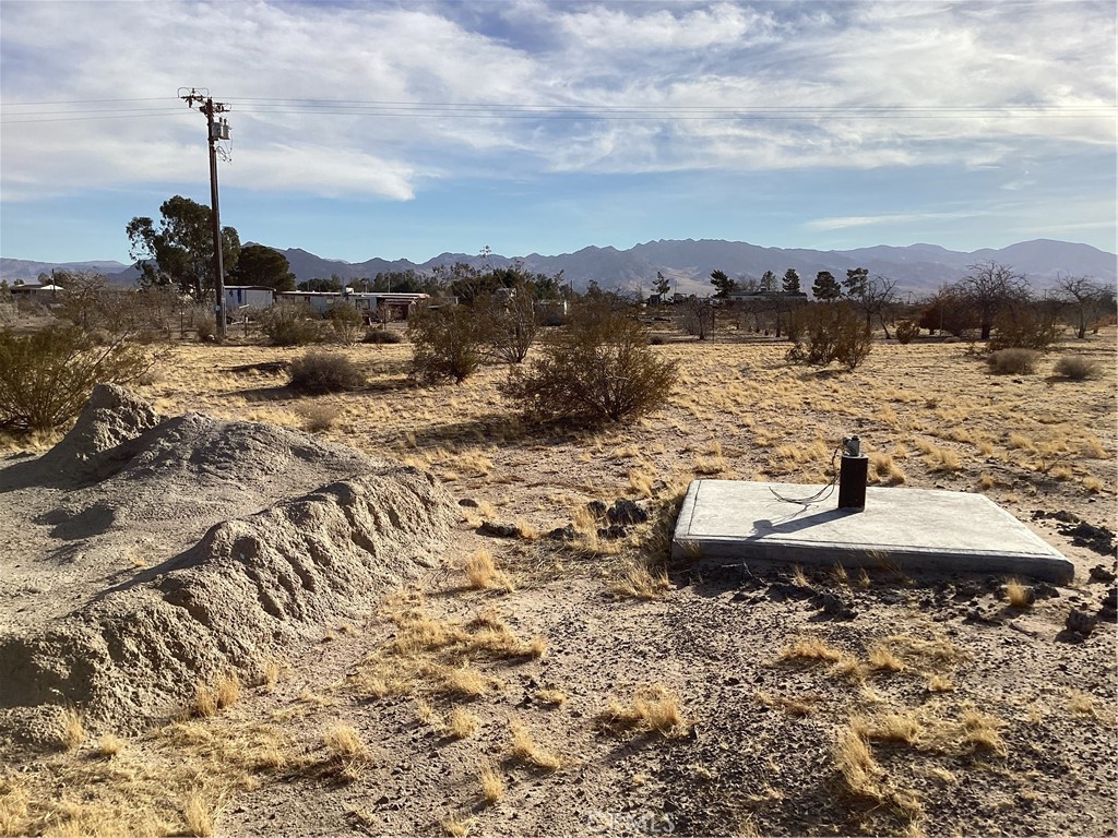 2.14 Acre lot with new well. fenced on three sides waiting for a home. Newberry Springs is sandwiched between the I-15 and I-40 about 25 minutes passed Barstow, about two hours before you get to Las Vegas or Lauglin. Mostly a farming Community growing Pistachios is our biggest crop. A solor plant is here. A restaurant, two truck stops, Community Center, Several Churches and Schools are small and personal.
We hike, ride horses, ATV and dirt bikes. Our just sit around like me enjoying my privacy and open skies. We live in a Valley surrounded by Mountains and have six private ski lakes here. Come on out and see us sometime.