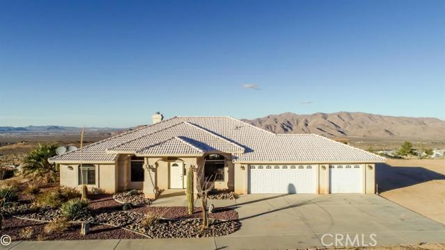 You will be rocked by this forever view out the back and from your pool! This is an amazing property with space for all your toys, dirt bike trail rides out your door, nice desertscape, concrete long drive, beautiful entertaining backyard with pool and spa under the stars, spacious garage and open living space. These properties rarely change owners so make your move now!