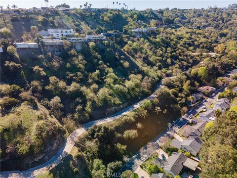 Photo of 3724 N Knobhill Drive, Sherman Oaks, CA 91423 (MLS # SR25039028)