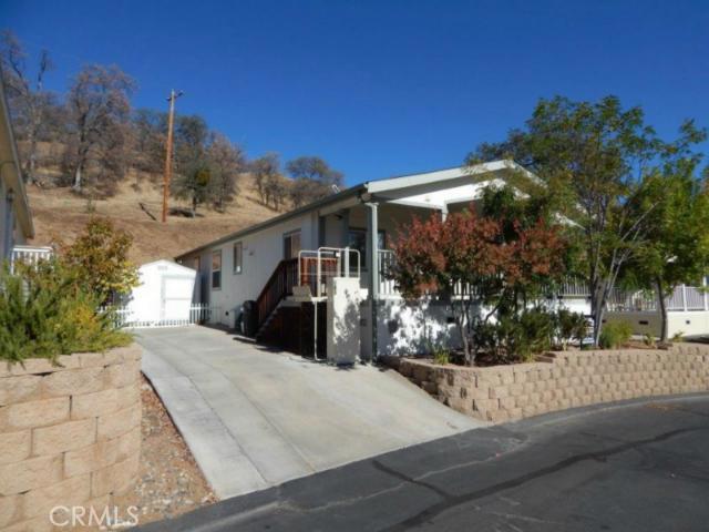 Enjoy this 55+ park with all of the amenities such as a pool, spa, clubhouse, dog park, RV and boat storage as well. The home is very compatible for handicap living with an elevator lift from the driveway to the front porch. Great open floor plan with extra kitchen cabinets, display shelves and storage. Great use of space with the kitchen nook and it still has a formal dining area.