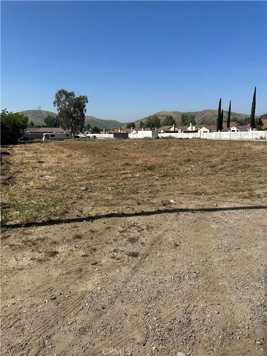 Lot is on a residential zone, across the street from Cajon High School