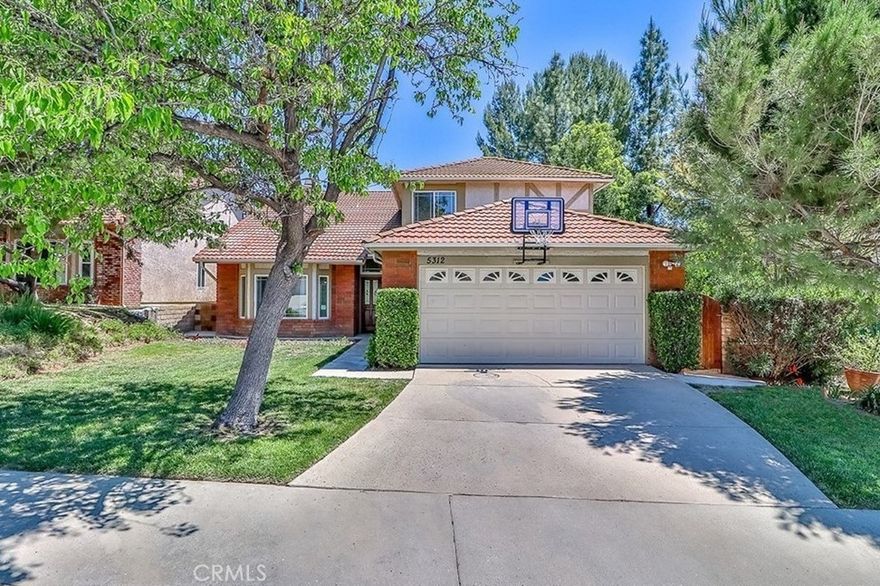 Spacious home with updated kitchen and pool in desirable Agoura Hills! Kitchen with tons of storage and granite countertops opens to family room with fireplace and overlooks pool. One-room suite on ground floor with only one step and bathroom with tub and shower across the hall. Enormous master suite has fireplace, balcony with new sliding doors to come, walk-in closet and huge bathroom with double sinks, separate shower and roomy soaking tub. Award-winning Las Virgenes schools. Come try out the good life in Agoura Hills!
