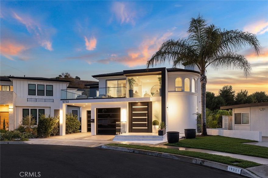 NEW PRICE-INCREDIBLE VALUE! Masterfully executed, contemporary entertainers dream custom estate nestled in coveted Turtle Rock awaits those who appreciate quality, privacy, chic elegance and being close to award winning Irvine schools.  Experience the pinnacle of luxurious living at 5732 Sierra Casa. The distinctive allure of this custom home which sits on a rare, 10,140 square foot lot and offers nearly 5,900 of living space, promises an extraordinary experience for the whole family. With nearly $2,000,0000 of unbelievable improvements, this extensively renovated residence boasts 6 bedrooms and 8 baths, offering unparalleled elegance and approximately 4,000 SF of living space on the first floor.  Absolutely nothing was overlooked in selecting the finest materials, inside and out, and never before has attention to the most spectacular lighting been showcased in a home in Turtle Rock. Effortlessly entertain in multiple living areas that seamlessly transition to the outdoors, where a beautiful pool, spectacular waterfall and expansive yard await. The custom layout provides versatility, ideal for accommodating extended family, an in-law suite, nanny quarters, a home office or bonus room for entertaining. Enjoy multiple areas to bask in the California sunshine and create an impressive setting for gatherings with family and friends. Capture spectacular sunset views and city lights from the upstairs rear suite and beautiful views of the hills of Turtle Rock from the extraordinary upstairs front suite, complete with it's own great room, kitchenette and balcony. Additional highlights include 4 main floor bedrooms, dual primary suites, a second floor bedroom which is ideal for a bonus room with a private view balcony, an oversized 3 car tandem garage, and abundant storage space. Community amenities offered by the HOA include access to 3 separate parks including pools, parks, and playgrounds. Conveniently located within the acclaimed Irvine School District, this property transcends mere accommodation—it's an essential destination. It’s a magnificent custom home re imagined to a level never seen before in Turtle Rock.