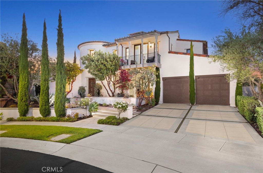 This beautiful home in the guard-gated community of The Summit at Turtle Ridge feels like a Mediterranean escape. A grand entry rotunda welcomes guests and plentiful French doors grace views to the stunning rear grounds. With drought-tolerant landscaping such as succulents, manzanita, and turf, spend the day lounging on the sun-soaked patio while taking in the panoramic canyon and city views beyond the turquoise salt-water pool and spa with cascading fountains. Entertain guests at the outdoor kitchen and covered dining area, then gather around the fire pit to watch the sun set. Additional patio space outside the downstairs guest bedroom is ample enough for basketball, and the turf lawn allows for some casual putting practice. Inside, the approximately 5,700 square feet of living space offers en-suite bathrooms to all five bedrooms, an office, living room, great room and bonus room. The chef’s kitchen includes a 8-burner Wolf range, premium stainless-steel appliances, a large center island with countertop seating for four, a nook, a large walk-in pantry and a butler’s pantry. The kitchen opens to a family room for easy entertaining, while a formal dining room lies in an adjacent room, opposite the opulent glass-walled wine cellar. Upstairs, a bonus entertainment room provides private family relaxation beyond the primary and three secondary bedrooms. A fireplace in the primary suite creates a cozy ambiance, while the very large bathroom epitomizes luxury, with a soaking tub separate from the shower, extra vanity space, a privacy toilet closet, and dual walk-in closets. Several balconies, including one in the primary suite, overlook the peaceful neighborhood, which lies on a highly desirable cul-de-sac. As part of the Summit at Turtle Ridge, residents enjoy resort-style amenities, including two pools, a clubhouse, fitness center, and a playground, as well as convenient access to hiking trails. Residents are also privileged to live near award-winning schools such as Vista Verde Elementary and Middle School, TVT, and University High School.