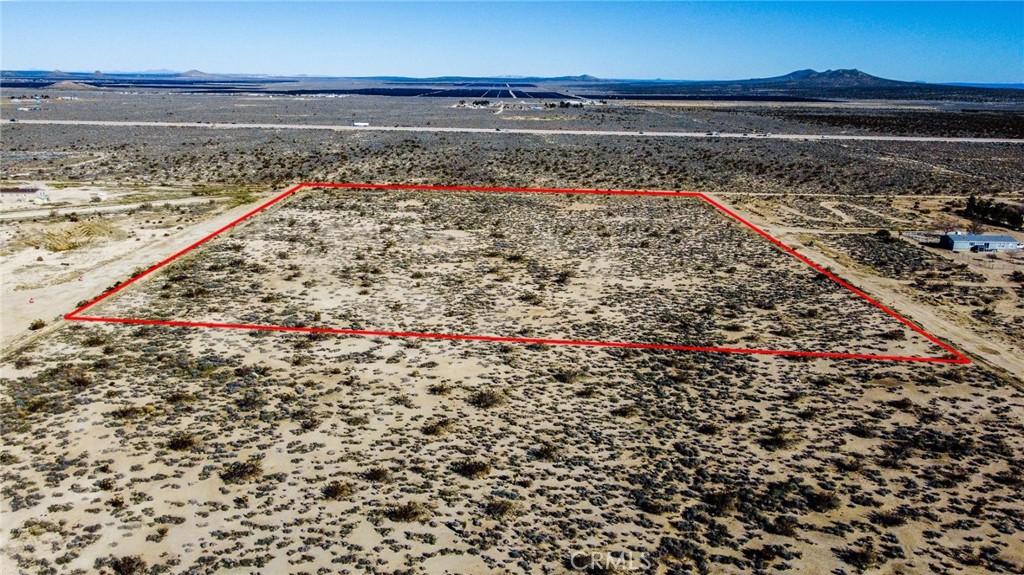 Introducing an exceptional opportunity to acquire four prime parcels of land, each spanning 2.55 acres, nestled in the captivating Mojave Desert of California. Please note that power, gas, and fiber optic (gigabit speed) run under or along the frontage road.
This unique offering is tailor-made for builders and investors seeking a harmonious blend of vast open space, recreational possibilities, and strategic location. Located six miles south of Mojave and six miles north of Rosamond.
The Mojave Desert, renowned for its awe-inspiring landscapes, sets the stage for these four lots, providing an ideal canvas for outdoor enthusiasts and motorsport aficionados. With a magnetic appeal to motocross riders, the flat terrain of these parcels ensures endless possibilities for recreational activities, making them a haven for those who seek the thrill of the desert landscape.
Unparalleled road access enhances the desirability of these lots, providing convenience and ease of connectivity for future development. The appeal extends beyond the surface, as water studies have been diligently conducted in the area, revealing a reliable water source. This invaluable feature significantly enhances the potential for sustainable and thriving development on each of the four lots.
The septic feasibility approval further streamlines the building process, offering a clear path for construction and ensuring compliance with environmental standards. An anthropological study has been completed, underscoring the commitment to responsible and informed development practices while preserving the cultural and historical aspects of the area.
Nestled in a serene and peaceful environment, these lots offer an escape from the hustle and bustle of urban life, providing a tranquil retreat for those seeking a harmonious balance between nature and modern living. This rare combination of accessibility, recreational appeal, and comprehensive studies make these four lots an ideal investment for a builder or investor with a vision for thoughtful and sustainable development.
Seize this opportunity to own a piece of the Mojave Desert, where the allure of motocross, outdoor adventures, and the promise of a peaceful lifestyle converge. The potential for creating a unique and thriving community awaits the discerning buyer ready to make their mark on this extraordinary landscape.