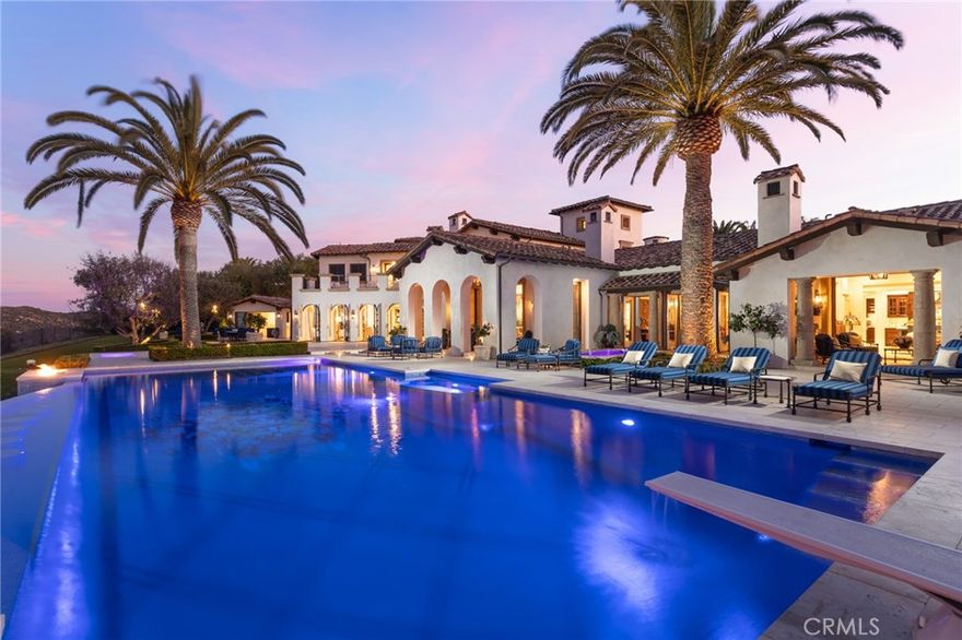 Elegance, opulence, and tranquility abound in this gorgeous custom Mediterranean 'crown jewel' estate in the highly sought-after community of Shady Canyon. This remarkable property showcases unbeatable views and pristine grounds in an architectural masterpiece. The expansive property sits on an 3/4 acre of land with over 12,000 SF of interior living space, including six bedrooms and 10 bathrooms. This home embodies the feel of a European resort, where immaculate grounds, a gorgeous infinity pool, multiple seating areas, a pool house, California room and endless vistas provide the ideal space to escape. Modern luxury and unlimited amenities including a gourmet kitchen, a complete catering kitchen and ample indoor and outdoor spaces offer the perfect home for large events or intimate gatherings. Unique and custom details include extensive millwork, coffered ceilings, hand-painted murals and artwork, and exceptional fixtures and textures throughout. The home itself offers abundant features including a theater, gym, spa, home office space, elevator, wine room, and a six car garage. Ideally positioned in a private and secluded area at the end of the cul-de-sac, this home is minutes away from excellent schools, shopping, hiking/biking trails, golf, swimming, and world class beaches.