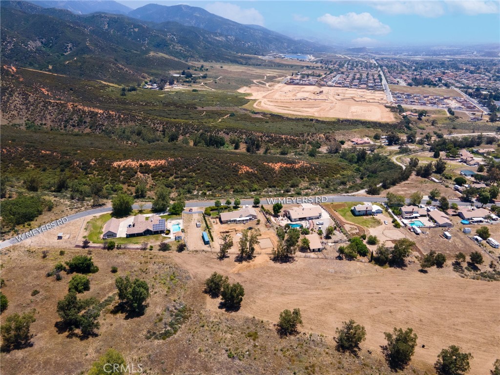 Looking for the perfect Homestead? We are pleased to present Meyers Road. This is the perfect location to build your dream estate! Flat leveled land with beautiful city and mountain views. This piece of land is one of the last remaining parcels belonging to THE Meyers Family. This historical family originally owned almost 2,500 acres of Rancho Muscupiabe in the 1800's, which we now know as Verdemont Heights. The large parcel: 0348-111-16-0000 is approximately 12.83 acres +/¬ and is zoned RES. This large lot consists of flat topography with paved frontage. The site is close to Cal State San Bernardino, Shandin Hills Golf club, many parks, and Glen Helen Amphitheater. Build your future Estate now!