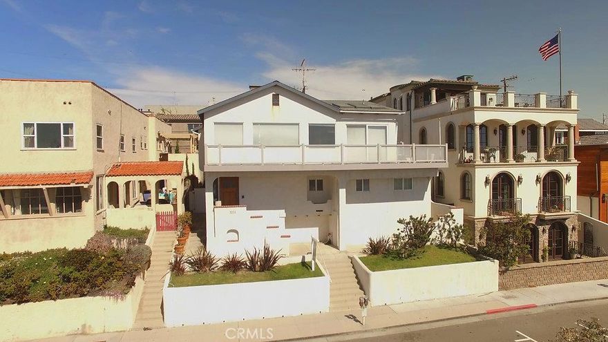 This trophy property is located in a bulls-eye location on Hermosa Ave, in between Longfellow Ave and 34th Street. It sits up high on an elevated 4247 sqft lot with 50 feet of prime Hermosa Ave frontage, offering the best ocean views in town. The current owners have fully permitted, shovel ready plans for a resort living 7300 sqft home (with 1800 sqft of whitewater view decks). The plans are presented by award winning architectural firm KAA with interiors by world renowned designer Tim Clarke. The main living space with chef's kitchen, living and dining rooms and two decks is on the top floor. The next level is dedicated to the master bedroom suite complete with his and hers: offices; walk-in closets and; bathrooms. The bedroom level has four expansive en suite bedrooms. The bottom level boasts a pool, yoga studio, kids entertainment room, guest suite and wine hall. The lot has a convex approval from the city allowing the home to sit higher on the lot, allowing a superior  floor plan and all four levels are above grade with THREE floors of ocean views. The property is East/West oriented, so the flow of your home can be fully focused right where it should be: on the sparkling Pacific Ocean.