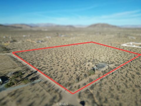 Photo of 57186 Karol Road, Landers, CA 92285 (MLS # OC25058840) Photo of 57186 Karol Road, Landers, CA 92285 (MLS # OC25058840)