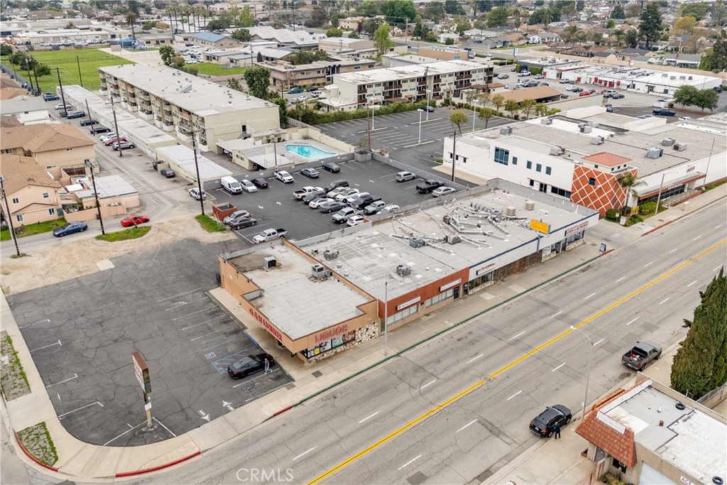 Free-standing 2,967 SF fully remodeled building situated on approximately 8,747 square feet of land. This property features a front office area with a large open working area, conference room, two private offices, kitchenette, two ADA compliant restrooms and storage area. The back portion of the building has a large room that could be opened up, large flex space currently used as a garage and a walk-in refrigerator. The building was completely remodeled in 2017 with new HVAC, plumbing, electrical, lighting, flooring, paint and all new fixtures throughout. It is currently used as one unit by an owner/user and will be vacated at close of escrow. It was previously a two-tenant building and the second entrance door still remains so it can be restored to two units. It has a rear parking area with 12 spaces and alley access. The zoning allows retail, restaurant, office, medical and other ancillary uses.
This property is located along highly trafficked San Bernardino Road between Grand and Barranca. It is less than one mile from Downtown Covina restaurants and shopping. It has close access to the 10 freeway.