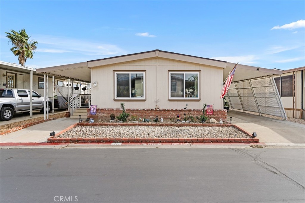 Beautiful 2-bedroom 2 bath mobile home located in the exclusive Rancho Ontario. This home offers a big main suite floor plan, with a beautifully updated stand-up shower. Updated kitchen countertops. This home's floorplan boasts the main suite and guest bedroom and guest bathroom in the back part of the home. The home offers a 2 yr A/C unit, 3yr roof, vinyl flooring throughout the home, newer water heater, the driveway can fit up to 2 small vehicles and also offers a shed. Renovated amenities await you offering a heated pool and spa opened year-round, a hall to host any event, our clubhouse offers a billiards room, card table room, a fitness room as well as a gym or lounge area to just sit and relax. The Park also offers an active area with two pickleball courts, bocce ball and we didn't forget about your fur babies, two dog parks. Don't miss out on touring and calling the beauty your home.