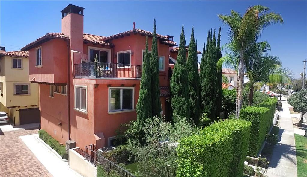 NEW PRICE and DON'T MISS THE AERIAL VIDEO! Amazingly quiet, like new luxury townhouse in the Tuscan Bay Villas complex developed by Van Zanten & White in 2006. End unit, central air conditioning and heating zoned by separate thermostats on each floor, easy 4 "short way" blocks to beach. 3 bedrooms, 3.5 baths. Master has jetted tub and double walk-in closets. Original owner. All new carpet and paint. Marble, granite, stainless, central vac, wired for sound and security. Extra soundproofing via triple pane windows and tight construction makes a huge difference from other developments on PCH! Direct garage access, washer/dryer in unit. Large deck with outdoor fireplace. Tastefully staged. West side of PCH between Sapphire and Topaz.