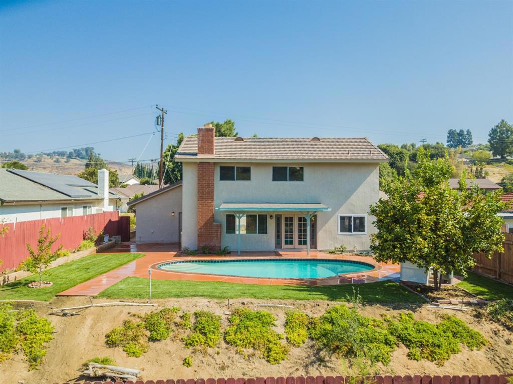 Beautifully remodeled home with stunning canyon views & large patio with pool, ideal for lounging with family or entertaining friends! Remodeled with today's lifestyle in mind, the lower level features an open floor plan with sprawling chef's kitchen with light quartz counters, white tiled back splash, expansive island with breakfast bar, dining area and living room with an inviting fireplace. French doors lead to the back patio with views extending across the canyon, and beyond. (See Supplement) Neighborhoods: Allied Gardens Equipment: Dryer,Garage Door Opener,Pool/Spa/Equipment, Washer Other Fees: 0 Sewer: Sewer Connected Topography: ,,LL