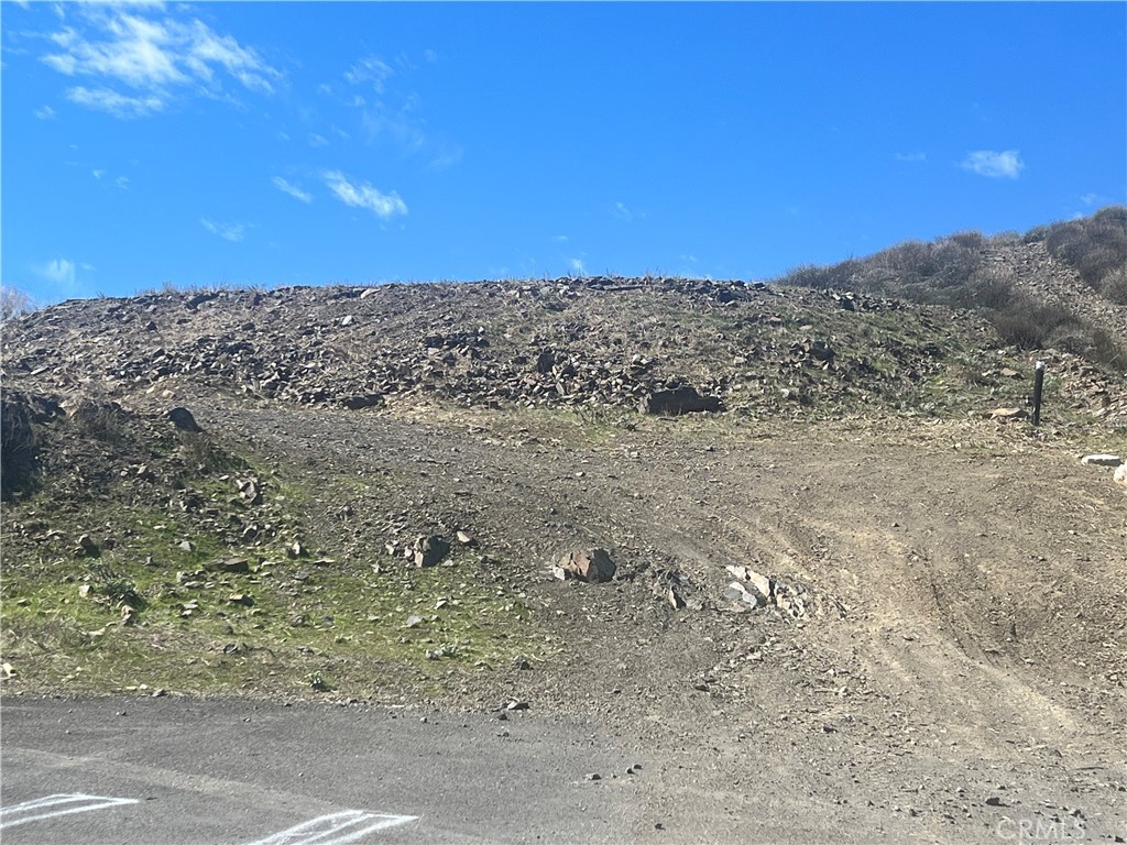 Over two acre parcel in the lovely Quail Valley. This is one of the largest available parcels in this developed area. Incredible views, of city, mountain, and canyon lake water views. There is water and electricity near by. The street is paved to the property line for ease of access. This parcel is very close to Roy W Kabian Memorial Park, a sprawling sanctuary! Build a wonderful private estate. Perc test for septic tank has been completed, buyer to verify all information. Buyers are to complete their own due diligence and investigation regarding all aspects of this property, including but not limited to zoning, permits, subdivisions, septic tanks etc.