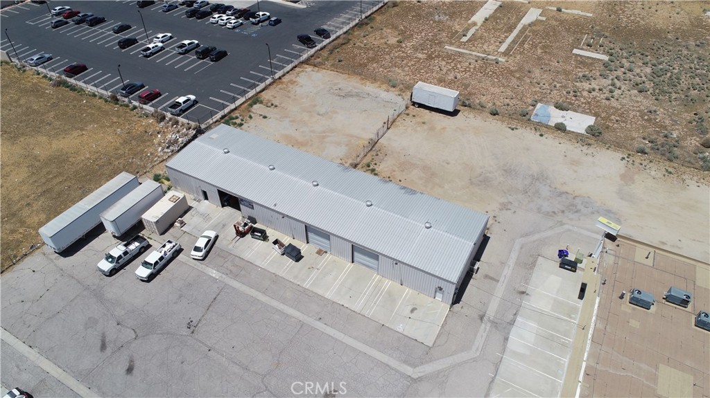 Conveniently located just off Highway 18, this property offers easy access to Interstate 15 and the surrounding cities of Lucerne Valley, Victorville, Hesperia, and Adelanto.
Available for Immediate Occupancy
We are pleased to offer a premier industrial warehouse space designed to meet your business needs. Unit #G features a 3,200 sq. ft. warehouse with approximately 400 sq. ft. of office space, complemented by an approximate 8,600 sq. ft. fully fenced outdoor yard. This unit provides a functional blend of warehouse and office space, ideal for various business operations in the Town of Apple Valley District 2 Zoning.
Strategically located just off Highway 18, with seamless access to Interstate 15 and the nearby cities of Lucerne Valley, Victorville, Hesperia, and Adelanto, this property offers unparalleled convenience and accessibility. For more information or to arrange a viewing, please contact us. Enhance your business with our strategically located and well-equipped warehouse space.
For more information or to schedule a viewing, please contact us today.
Elevate your business operations with our versatile and conveniently located warehouse spaces.