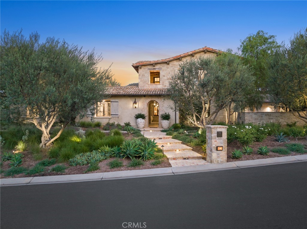 Welcome to 42 Echo Glen and be transported to the French Mediterranean with its truly authentic design, imported materials, and premier location.