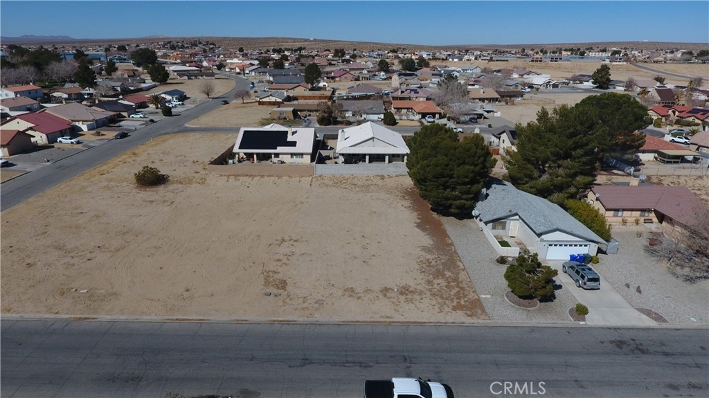 Discover the perfect canvas for your dream home in the highly sought-after Silver Lakes community of Helendale! This prime, flat lot is ready for you to build, with utilities nearby and easy access on a paved road. Nestled in the serene Mojave River Valley between Victorville and Barstow, Silver Lakes offers a unique blend of tranquility and recreation with low monthly HOA dues.
Enjoy an array of resort-style amenities, including a 27-hole championship golf course, two private lakes for fishing, swimming, and boating, plus a beach and boat launch. Stay active with tennis, pickleball, and bocce ball courts, an Olympic-sized swimming pool, a 24-hour gym, and equestrian facilities. The clubhouse, library, RV park, and community events create a welcoming environment for all ages.
With breathtaking views of the San Bernardino Mountains and the shimmering lakes, this lot presents an incredible opportunity to build your custom retreat in a thriving and picturesque community. Don’t miss out—schedule a visit today and start turning your vision into reality!