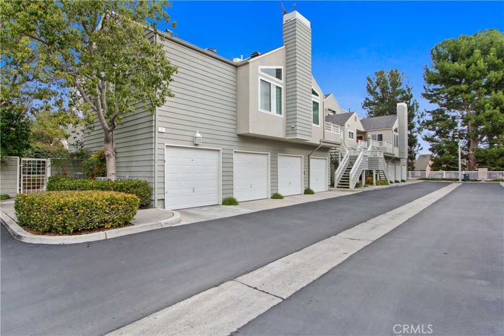Welcome to 11 Elmbrook, a 2 story upper level open concept 2 bedroom 1 3/4 bathroom condominium unit. The main level is well appointed with soaring vaulted ceilings, recessed lighting, gas fireplace, spacious bedroom with walk in closet, remodeled full bathroom with mermaid tiled floors, bonus room perfect for home office or craft room with direct access to outdoor balcony, remodeled galley kitchen with quartz counter tops. The 2nd level boast a primary suite with vaulted ceiling and 3/4 bathroom. Vinyl plank flooring through out, washer and dryer hook ups are on the main level. 1 car detached garage just steps from the unit. Glenwood Village is a well maintained Cape Cod inspired community with a host of amenities for its residents to enjoy. 11 Elmbrook is just a short walk to the heated spa, olympic size swimming pool perfect for daily laps, kiddie pool, club house and gym. The community is well appointed two lighted tennis courts, picnic area with three gazebos, outdoor bbq and play ground right next to the pool. Enjoy a quick game of soccer, baseball or basketball at one of the many adjacent parks. Conveniently located 1.7 Miles to Aliso Viejo Town Center, .9 Miles to Aliso Viejo Country Club, 2 Miles to the 73 Freeway, 2.7 Miles from local Hiking trails, 3.5 miles to Soka University.