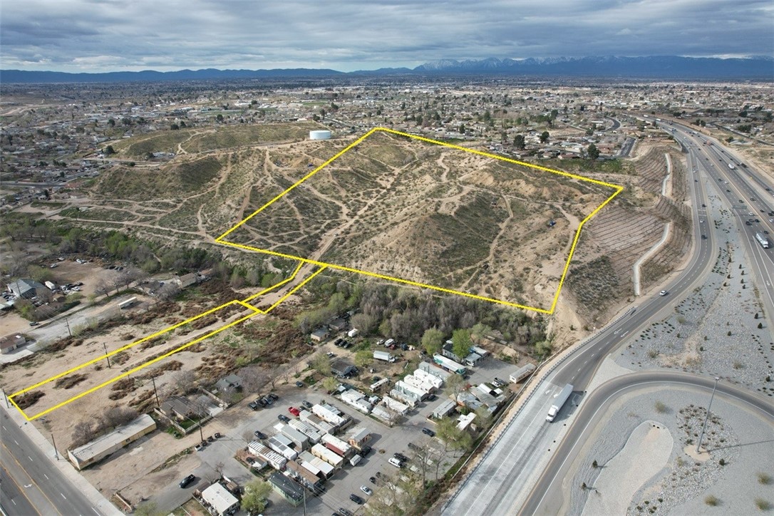Major price reduction on this terrific 24-Acre Development Opportunity on busy D Street just east of I15 and the new D Street off ramp. Access is from D Street below or La Paz above. Awesome views from this large hillside parcel. Now is the time to start acquisition and preparations for the next real estate upswing with the upcoming high-speed rail to Las Vegas. Buy now and start development/entitlements or hold for possible future appreciation. This rare parcel provides numerous possibilities. Buyer to conduct their own Due Diligence with regard to zoning, land use and development. Bring all Offers.