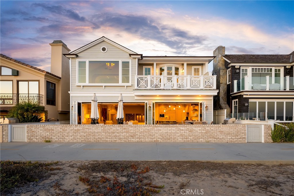 Experience the ultimate coastal living experience in this impeccably built, fully furnished 5-bedroom, 5.5-bathroom home, perched on one of the most coveted stretches of Newport Beach's iconic Balboa Peninsula. With panoramic views of the sand and the sparkling Pacific Ocean, this home sets the standard for luxury and sophistication.
Boasting a rare double lot and one of the highest elevation lines on the Peninsula, this property offers unparalleled vistas and privacy. Every aspect of this custom residence has been thoughtfully curated by renowned interior designer Jeff Andrews of Jeff Andrews Design.
The open-concept main floor invites effortless entertaining, with a state-of-the-art gourmet kitchen featuring top-tier appliances and an expansive living and dining area complete with a custom fireplace. Accordion doors open to the private patio, ideal for al fresco dining with a Wolf BBQ, multiple seating areas, and a fire pit for cozy evenings by the sea.
The lower level features a sophisticated bar, a versatile salon or office space, a powder room, and convenient access to the two-car garage and one of two laundry rooms. The first set of stairs leads to three spacious bedrooms, each with en-suite bathrooms and walk-in closets. For ultimate ease, an elevator provides access to the second floor, where you'll find a secondary family/entertainment room preceding the grand master suite.
The master retreat boasts breathtaking ocean views, a hidden TV, and a private balcony. The spa-like master bath features a large walk-in shower, a freestanding tub, and luxurious custom tile. A second laundry room with ample storage is located on this level, adding to the home's convenience.
At the rooftop level, you'll find the 5th bedroom and an expansive outdoor entertainment space, including a fully equipped bar, TV, fireplace, lounge, and 12-person dining area. Ascend to the rooftop deck for the ultimate in luxury, offering a hot tub with sweeping panoramic views of the ocean and Peninsula.
With direct beach access & an array of beach equipment, this Newport Beach gem redefines luxury living. Don’t miss the opportunity to call this one-of-a-kind custom-built property your home.
Monthly price depends on term & season.