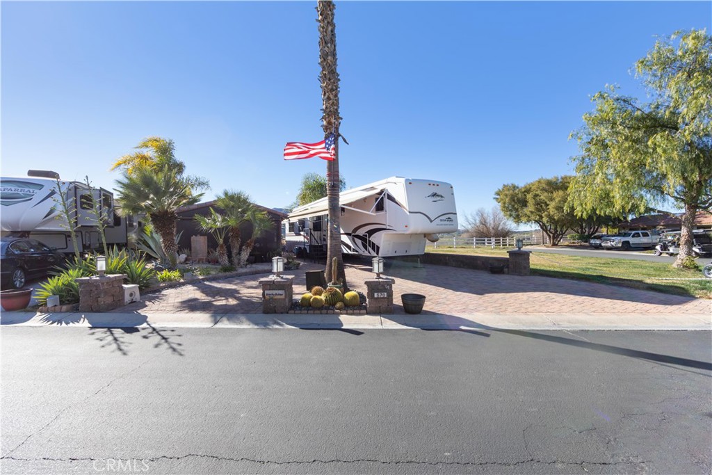 Extra Large Casita 1300+ SF is an Entertainer's Dream!! One of the largest lots found at Rancho California RV Resort, this one is sure to impress. Located on the back side of Rancho RV Resort with incredible VIEWS! Living Area, Dining Room, Bar Area, Kitchen, Laundry. This premier lot has rarely been available - schedule a tour today! ***VIEWS*** of the golf course, water and mountains!! Rancho California RV Resort provides amenities such as a 14 hole Executive PAR 3 Golf Course (no fees for owners), 5 Pools/Jacuzzis, Tennis courts, Pickleball courts, Dog park, Club house, hiking trails, Horseshoe lawn and onsite restaurant and grocery market. The resort is guard gated with no age restrictions. Monthly HOA fee includes use of the golf course, amenities, trash pickup at lot, water/sewer, cable TV and common area maintenance. If you are considering a premier Southern California RV destination, don't miss out on visiting Rancho California RV Resort - schedule a showing today!