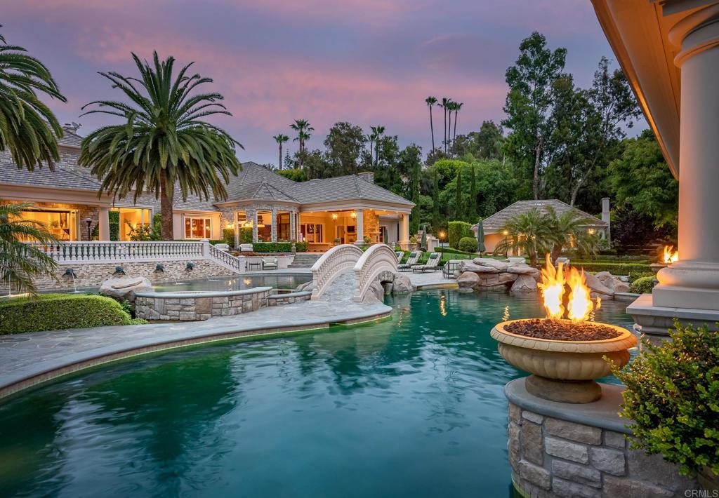 Welcome to a Spirited and Sophisticated interpretation of relaxed living at the Highest Quality Level. One of the most beautiful, near 3 acre all usable lots, in the coveted guard gated community of Fairbanks Ranch. This Custom Estate shows like Brand-NEW and offers a Modern & Relaxed environment to refuel, recharge and enjoy. Luxury living is yours with the grand open spaces, seamless indoor / outdoor living and incredible amenities. Expansive Resort style Pool and Spa, detached Guest home, regulation Tennis Court, Putting Green, fruit garden, walking paths, entertainers wet bar and wine cellar, Gym, His and Her studies, gorgeous first floor master suite and generous spa bath, outdoor kitchen with pizza oven, attached and detached garages and so much more. A Timeless Jewel to indulge in for a lifetime!