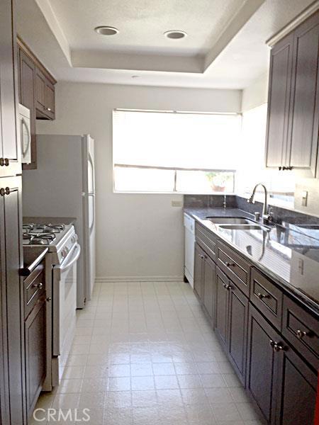 UPPER CORNER UNIT WITH PLENTY OF NATURAL LIGHTING IN THE WELL MAINTAINED COMMUNITY OF WOODBRIDGE. This 2 bed / 2 baths offers an open floor plan between the dining and living area. . The kitchen offers plenty of storage and counter space, recess lighting, with a view out the window. Spacious master bedroom with a connected outdoor balcony space. Step out front to your own enclosed patio space. Just steps away to the pool, playground, basketball court and picnic area. Excellent schools, shopping centers and the freeway nearby.