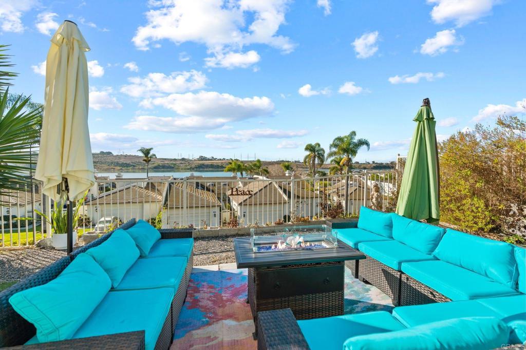 This Fully Furnished 2 bedroom and 2 baths Laguna del Mar Home in Carlsbad, California has a serene view of the Lagoon. The lagoon has water activities such as paddleboarding and kayaking, making it an ideal spot for outdoor enthusiasts. Tamarack Beach is just minutes from Laguna del Mar. Carlsbad Village, located just a short drive from Laguna del Mar, is a charming downtown area filled with unique shops, restaurants, and local events throughout the year. This single Level 2 bedroom and 2 bath condo boasts modern amenities and luxurious touches, making it the perfect place.
