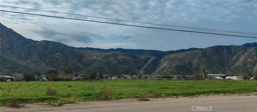 Don't miss out on this rare opportunity to own this 1.73-acre parcel of land in the desirable area of Cabazon, CA. The County of Riverside allows for the construction of two mobile homes on this parcel, providing endless possibilities for development. The property has access to water and power on the
street, and while the area is on septic, the location is ideal for those looking to build their dream home or invest in a profitable project. The freeway is approximately 1.5 miles. Morongo Casino and Shopping Center is approximately 4.5 Miles away. Don't wait, make your move today and secure this prime piece of land before it's gone! THE BUYER HAS TO DO THEIR DUE DILIGENCE, AND THE PROPERTY IS SOLD AS IS WITH NO WARRANTY FROM THE SELLER OR THE AGENT.
Info deemed reliable although not guaranteed. Any num. statements dimensions and/or lot size are APPROXIMATIONS
and have not been verified by the seller or broker. The buyer is advised to investigate the condition and suitability of all aspects of the property.