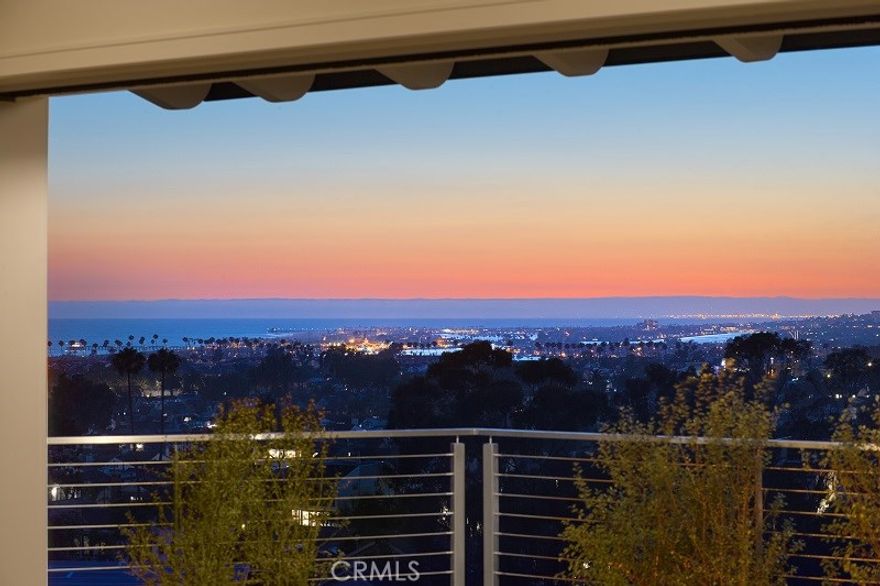 This stunning, newly-rebuilt, Transitional style Corona del Mar home features a spectacular ocean, Newport Harbor, coastline and city lights view from almost every room. Stylishly redesigned by renowned architect, Tim Nicol, the home has the elegance and intimacy of traditional style with a contemporary twist of modern design blending a rich mix of textured materials including reclaimed wood, metal roofing, white oak hardwood floors, lacquered white cabinetry and a marble kitchen and baths. The clean lines and minimalistic design seamlessly blend indoor outdoor living with walls of retracting sliding glass doors that flood the home with natural light. The property is entered by a private courtyard with a swimming pool, spa, entertainment area, and fireside sitting area. The primary level of the home features a large view living room with a fireplace and vaulted ceilings, a huge island kitchen with top-of-the line stainless steel appliances, white cabinetry, Calcutta countertops, a &#8220;dirty kitchen&#8221; and a butlers pantry; a fantastic dining area overlooking the pool and a &#8220;showstopping&#8221; master suite with an office and elegant bath with a free-standing tub, huge walk-in shower and marble flooring and accents.  The lower level of the home features a huge game/media room with a wetbar, refrigerated wine storage, two bedrooms with ensuite baths, a view bedroom, a large gym and two additional baths. The house is surrounded with ample sized decks and fun entertaining spaces.