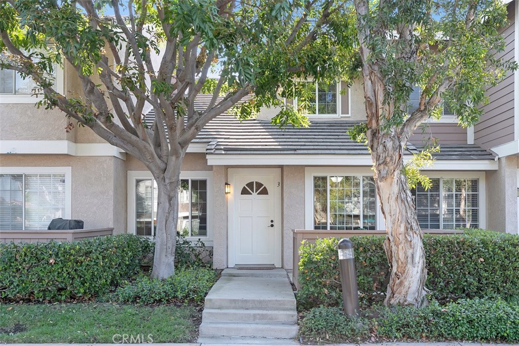 Gorgeous, completely remodeled 2 bedroom, 2.5 bath townhome in the rarely available Northwood Park development. Featuring custom kitchen with white shaker style cabinetry, quartz counters, large farm style sink, stainless steel appliances and super functional pull out shelving. Separate dining area overlooks the kitchen and tranquil patio. Oversized family room with cozy fireplace and vaulted ceiling is also open to the kitchen and dining area. Spacious master suite complete with walk-in closet and remodeled bathroom offers custom dual vanities, stone countertops, shower w/designer details and more. An additional bedroom along with a remodeled secondary bath can also be found upstairs. Conveniently located downstairs powder room. Brand new carpet and paint throughout! Dual paned vinyl windows, wood laminate flooring and a newly replaced water heater are also featured. Large two car, finished garage offers laundry area and built in cabinetry w/pull out drawers for added storage possibilities. There is even an added 220 volt electric car charging station! Conveniently located close to neighborhood pool and spa, shopping, parks and recreation facilities. Walking distance to award winning schools.