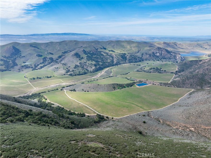 A vineyard of this caliber rarely comes to market. Developed by a world-renowned wine company for its ultra-premium brands, North Canyon Vineyard spans 1,672± acres across San Luis Obispo and Santa Barbara counties in the heart of the Santa Maria Valley AVA.



Beyond its proven reputation for wine grape production, the property offers remarkable versatility for various high-value agricultural ventures. With ideal climate conditions, prime soil diversity, and reliable water resources, there is significant potential for conversion to high-value crops such as berries, leafy greens, and specialty vegetables, in addition to continued premium grape production.



With 919.8± planted acres of Pinot Noir, Chardonnay, and select white varietals, this top-tier estate sits in one of California’s most acclaimed winegrowing regions, where a unique transverse valley funnels cool Pacific breezes, extending hang time for optimal ripening. Positioned at elevations reaching 600 feet, the vineyard’s upper-bench shale rock soils produce world-class Pinot Noir, while the fertile valley floors yield high-quality Chardonnay, both commanding premium bottle prices.



Water security is a key asset, with six agricultural wells delivering 2,210± GPM, supplemented by natural water table recharge from the Twitchell Reservoir. With a history of excellence, a private and stunning setting, and a scale that supports long-term investment growth, North Canyon Vineyard is a legacy estate positioned for the future.



Wines sourced from this site have earned 90-96 point ratings, reinforcing its pedigree among the region’s most sought-after producers. The 2 parcels are available separately as San Luis Obispo County APN 090-422-005 CRMLS Listing ID: NS25058918 and Santa Barbara County APN 131-230-005 CRMLS Listing ID: NS25079247.



Offering Package available upon request.