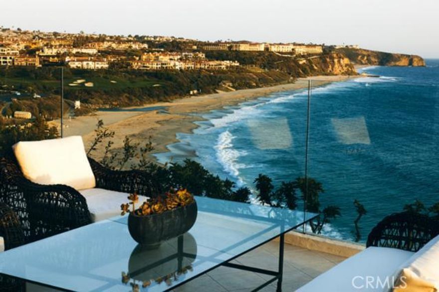 Set atop the oceanfront bluff in the private community of Monarch Bay, this tasteful and sophisticated contemporary-style residence enjoys sweeping panoramas of the ocean and coastline from throughout. Completed in 1997 and freshly restyled and refurbished, the appealing single story design features tastefully appointed interiors and expansive rooms in over 5,000 square feet of living area. Ideal for living and entertaining, there is a comfortable flow between the public rooms and the oversized oceanfront terrace. Walls of floor-to-ceiling glass take in the vast sea views along its waterside exposure. Situated around a delightful and private courtyard with swimming pool, the residence incorporates all of the defining elements of timeless California design. Oversized rooms, high ceilings and skylights throughout create a relaxing interior bathed in light and ocean views. The generous scale is continued in the ocean view master suite which features twin baths and dressing areas. Three additional bedrooms are situated surround the courtyard. The entire house is discreetly set away from the street by a gated courtyard entrance and private motor court. Monarch Bay&#8217;s private oceanfront beach club &#8211; the only one of its kind in Orange County &#8211; is a moment away.