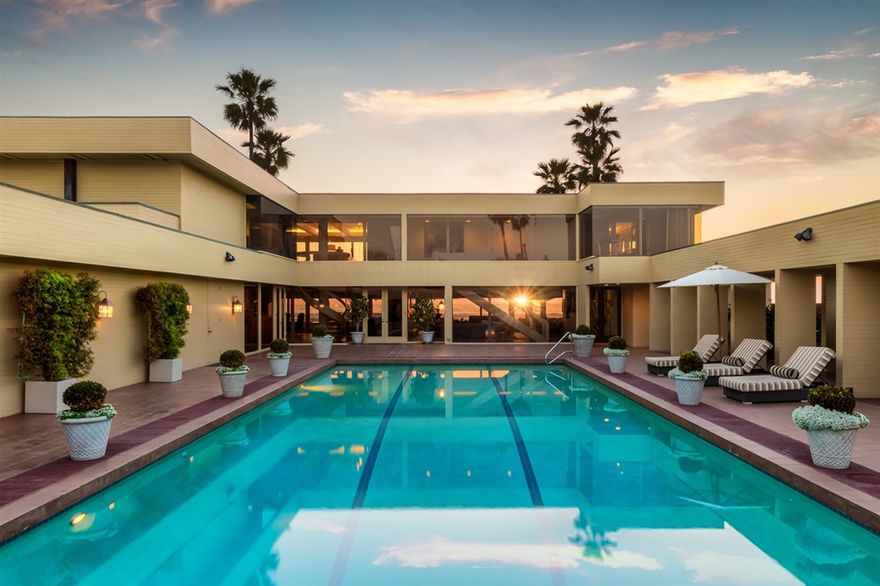 Panoramic ocean views from La Jolla to San Clemente; this ocean front compound represents the best of San Diego. Set on almost &#190; of an acre, this 5 bedroom estate spans an impressive 80 feet of ocean frontage. Private and primed for entertaining, the interior courtyard with dramatic swimming pool and spa is surrounded by a sun-drenched patio, a full size culinary indoor-outdoor kitchen, and 2 guest suites.  The open concept main residence, with walls of glass showcasing the Pacific Ocean, casually flows from the courtyard to the oversized beach patio. The master retreat presents breathtaking ocean views, expansive his/her closets and baths, fireplace and wraparound beach deck. The privately gated driveway can accommodate upwards of 18 cars in addition to the 4-car garage. These exceptional amenities coupled with the property size and location are unparalleled anywhere else in this beach community. Don&#8217;t miss this rare opportunity to own one of the largest lots on the beach..  Neighborhoods: Beach Equipment:  Dryer,Pool/Spa/Equipment, Satellite Dish, Washer, Water Filtration Other Fees: 0 Sewer:  Sewer Connected Topography: LL