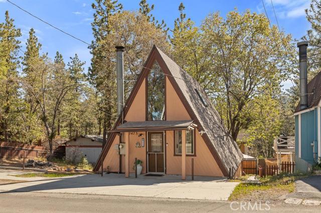 Bucks Cabin... A Fully Furnished A frame chalet. Current short term rental permit with the county that will be assumable with everything you need for your getaway cabin around the corner from the National Forest. Parking for two with level access. Roof with two skylights installed in 2016, roof is also wrapped with double sided aluminum covering to provide more insulation for heat and cold. Shingles are landmark reflective shingles to provide more insulation. Most appliances less than 5 years old, with tools, ring doorbell, nest thermostat, air conditioning unit, snow toys and so many extras. Downstairs is one bedroom with a patio attached with composite decking and a bathroom with washer and dryer. Up the spiral staircase is a loft bedroom with sunlights to let the light in. Buyer to verify square footage. This cabin has been lovingly maintained, but it's time for this chapter in the story of Bucks Cabin to close, will you help write the next chapter?