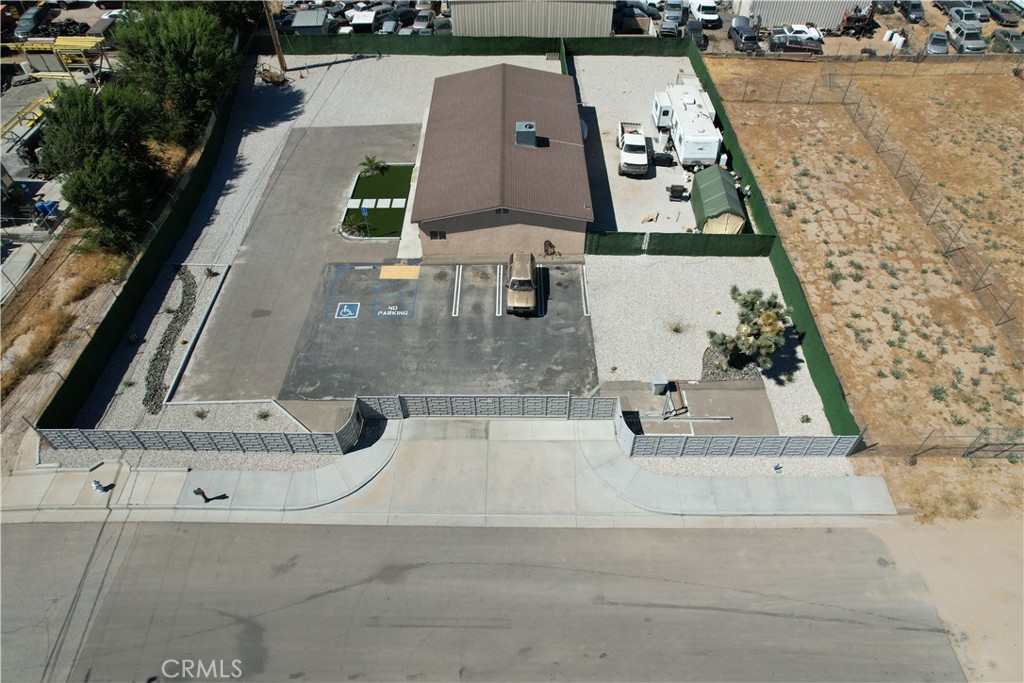 This unique light industrial opportunity in the City of Hesperia embodies the dream of an owner-user. The property, spanning over 2000 square feet, boasts a well-designed office space, multiple restrooms, and an electronic roll-up door. With a recently revitalized exterior, featuring new drought-tolerant landscaping and a fresh coat of paint, this property radiates pride in ownership. The seller has invested significantly in the property's renovation, ensuring it meets all ADA standards and includes an electronic opening gate. With its state of the art fully fenced construction yard this property is Ideal for exterior equipment storage and overnight parking for work vehicles while enjoying a the comforts of a fully air conditioned office and warehouse.
Strategically positioned between the bustling metropolises of Las Vegas and Los Angeles. Hesperia defines itself as a pivotal geographic junction. Offering convenient accessibility to 15 major freeways and a skilled labor force Discover the myriad opportunities and favorable attributes that make Hesperia a compelling choice for investors and visionaries alike.