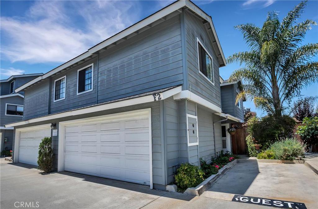 Welcome to this wonderful home in the Harbor Pointe Condos community, one of the quietest and nicest neighborhoods in Costa Mesa. The well-maintained community is built in Cape Cod style and offers cool breezes and a beach-y feel. You'll walk through the pretty landscaping around the front door into the cool living spaces- the kitchen with ample storage, colorful decor style and spotless tile counters, the dining room with smaller patio outside the sliding door, and the family room with fireplace and a slider to the larger patio (there's a fountain with gold fish!). Upstairs are two spacious masters, each with large closets and bathrooms- the bigger has a little nook that's perfect for an office, reading nook, or nursery. Tile or laminate floors run throughout, there is a ceiling fan in every room, custom paint, and the house is pristine and well-kept. It's close to shopping, dining and entertainment, as well as minutes from beaches, resorts, amusement parks, the Orange County Fairgrounds and South Coast Plaza.