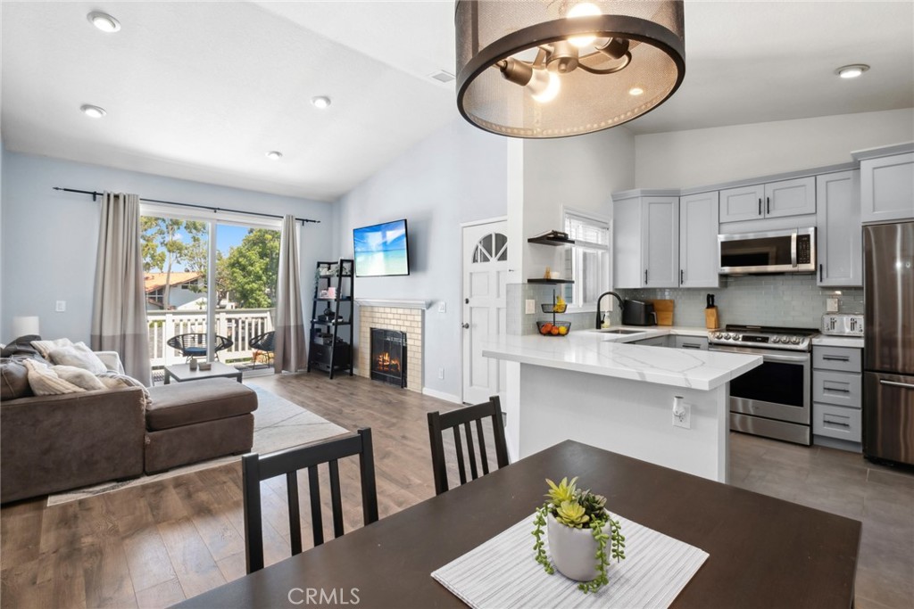 Discover the charm of 12042 Sylvan Riv, a turn-key condo that has been thoughtfully upgraded and is ready for you to call home. Nestled in the exclusive New Chase gated community, this inviting space boasts an open floor plan, high ceilings, and an abundance of natural light. The beautifully remodeled kitchen comes equipped with all-new appliances, quartz countertops, and soft-close cabinets. Enjoy the serene outdoor patio, perfect for soaking in the sunshine. The community offers a pool and is conveniently located near freeways and top-rated schools, making it ideal for both comfort and convenience.
