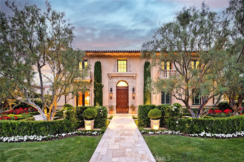 This timeless coastal estate spanning over 9400 sqft rests atop one of the communities most desirable streets offering quintessential resort living within the comfort of your own home. Secured behind the custom home neighborhood within Crystal Cove this property boasts 270 degree panoramic views of the California coastline up to Palos Verdes, twinkling lights of Newport Harbor, with Catalina and year round sunsets resting in the backdrop creating a canvas of natural art 365 days a year. Offering 5 bedroom suites and 8 bathrooms this home also offers but is not limited to, expansive formal and informal communal living spaces, wood clad library, chefs kitchen with premium appliances, and decks and loggia melding the interiors with the exterior grounds allowing for enjoyment of the picturesque southern California coastal climate. The exterior grounds are center around the exquisite pool and spa with lounge, dining, BBQ Pavilion, and putting green all in the foreground of endless views into the horizon.