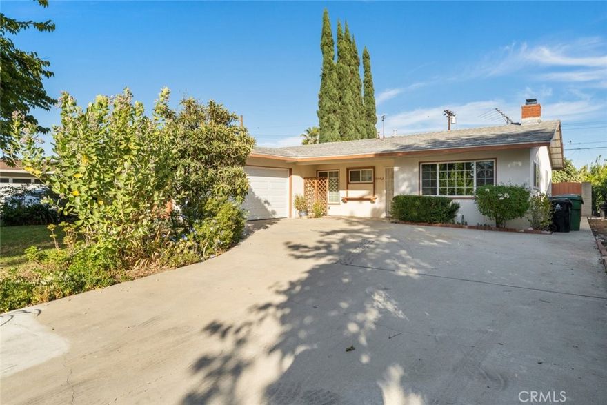 Deep in the flats of Granada Hills, located on a quiet residential street with beautifully built homes, sits a 1,570 sqft, 4-bedroom, 2-bathroom single family home move in ready for the next lucky buyer. A large, paved driveway, that’s surrounded by luscious greenery, leads to the front entrance of the home and upon entering you are greeted with light gray laminate flooring throughout. A living room on the left of entry with a stone fireplace and natural lighting. Further ahead is an open floor layout with a family room that gracefully transitions into the kitchen. A clean and chic looking kitchen which features gray countertops, gray cabinetry and stainless steel appliances. Venture down to the hallway that connects a common bathroom with 3 bedrooms, all of which have carpet flooring and built-in closets. Hallway also includes a primary bedroom with an en suite bathroom and direct access to an attached two car garage. Home includes access from the living room to a large backyard, with tons of room to set up for entertaining, and an induvial laundry room with a washer/dryer hookup.