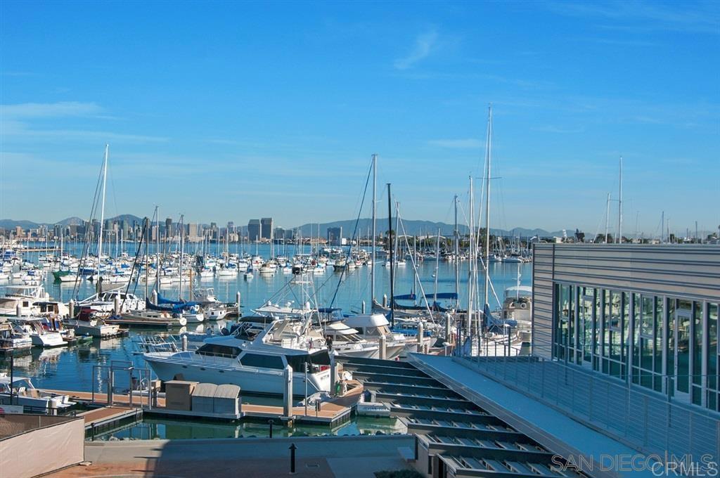 Choose whatever lifestyle suits you in this beautiful gated Waterpoint home close to the marina! This magical spot offers an abundance of activities with boats going in and out, cruises and water sports! There are numerous restaurants close by overlooking the water and marina to downtown San Diego! The ground floor offers open air living with two large enclosed patios, one which contains a built in fireplace. The gourmet kitchen has stainless steel appliances, a center island, quartz countertops and a walk in pantry. Also included is a hot water circulating pump for quick hot water. It is open to the dining/great room area for easy conversations. The first floor bedroom/office has its own ensuite bath and overlooks the front patio. Easy care wood floors make up the first floor and stairs. On the upper level, two spacious bedrooms have ensuite baths and walk in closets! The largest main bedroom overlooks the marina and downtown San Diego! The main bathroom has a luxurious soaking tub and large shower. Another great amenity is a tankless water heater! Two parking spaces are located in the secured parking garage with storage closet #7. The garage has 2 electric charging stations. Very convenient to San Diego Airport and Downtown! During the holidays, enjoy decorated boats cruising on the bay! This is a year around delight!