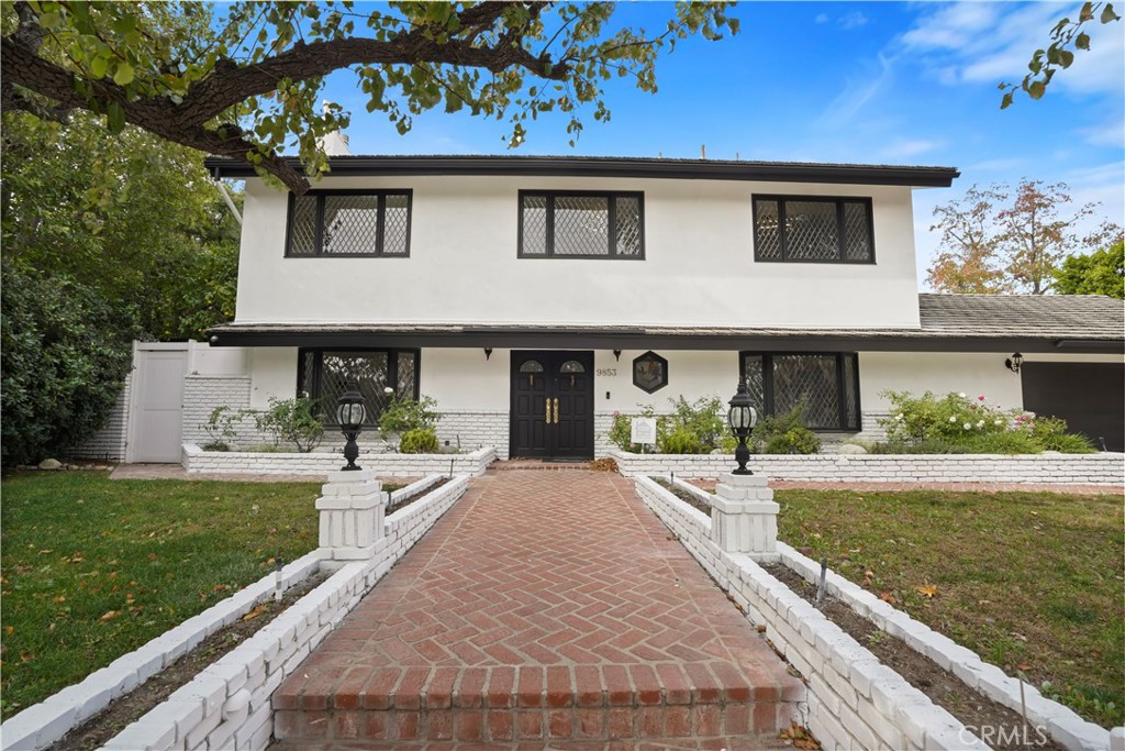 Beautiful Patrician Estate home offers a harmonious blend of luxury, comfort, and functionality. With new flooring, fresh paint, and meticulous attention to detail, this home is truly a standout. As you step inside, you're greeted by a spacious formal living room featuring a stunning custom marble fireplace and a sweeping staircase that adds an air of elegance. The heart of the home is the kitchen, which seamlessly opens to the family room, creating a perfect flow for everyday living and entertaining. The family room boasts vaulted ceilings, a large brick fireplace, and direct access to outdoor patio, ideal for hosting gatherings or enjoying peaceful moments outdoors. The home also includes a spacious dining room, main-level office/bedroom—perfect for flexible living arrangements, laundry room and a guest bath. Upstairs, the private primary suite offers a serene retreat, complete with a custom fireplace, a walk-in closet, and a spa-like en suite bathroom with dual sinks, a soaking tub, and a separate shower. For those who love outdoor living, the large sun/lounge room opens to a private deck overlooking the backyard, where you’ll find a tranquil pool—perfect for relaxation. Additionally, upstairs you will find 3 bedrooms and a generous size bathroom with dual sink and shower. Step outside for a full relaxation and leisure, enjoy the garden and lash grassy area. The side yard includes a gated area with ample space for RV or additional parking. Conveniently located near by shopping, dining, and with close proximity to CSUN. This home offers the perfect combination of privacy, style, and convenience. Don’t miss the opportunity to experience this exceptional property—it’s a must-see!