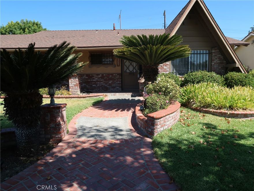 This beautiful corner lot is surrounded by decorative brick planter beds, a charming front porch and lush landscaping. The welcoming curb appeal is attractive and shows its uniqueness. Relax at the swimming pool to enjoy its classic look and inviting appearance of the custom & unique pattern of the custom stone deck & landscaping. The updated kitchen includes ample counter space, cabinets, roll out drawers and center island. The custom built enclosed patio/den provides additional living space, and has view of the charming rear yard. The spacious laundry room is conveniently located off the kitchen. Fireplace. Updated hall bathroom. There is a private bathroom off of the primary bedroom. The modified three car garage can be useful for an ADU, workshop ect. El Camino High School.