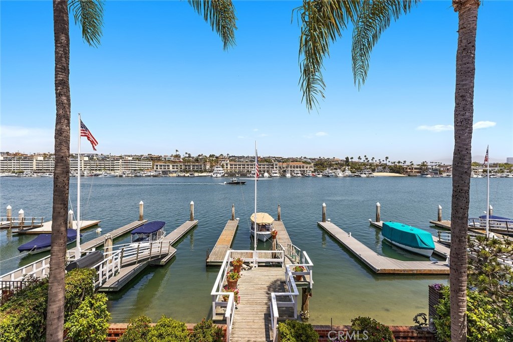 Incredible opportunity to build yur ideal home or remodel the existing bay front home located on an oversized Lido Isle lot. Original home has been remodeled and has four bedrooms, an office and a spacious bay front patio. Boat dock can accommodate a large boat. Fabulous bay and city lights views plus a front row seat to the annual Holiday Boat Parade. Close proximity to the Lido Marina Village, Cannery Village, fabulous restaurants and the ocean. Lido Isle has tennis courts, beaches, docks, boat storage, parks and children's playgrounds.