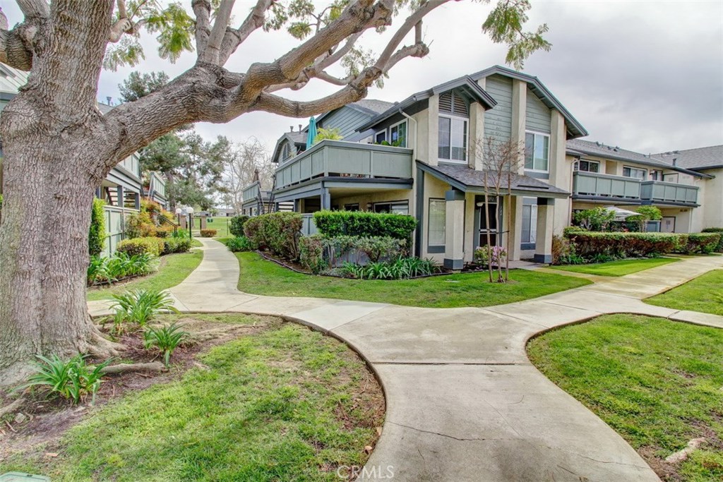 Location Location. This newly remodeled ground floor end unit located in beautiful Windward Cove, is located in one of the best locations offering an exceptional view of Terry Park. Take your morning coffee in your spacious patio with awesome view of park. Just steps to pedestrian gate giving you direct access to park, perfect for those afternoon walks. All new paint, all new waterproof laminate flooring in kitchen, dining ,living room, and bathroom. Both bedrooms have all new plush carpeting. The very functional sunny kitchen features new quartz counter tops, new stainless steel sink, and designer faucet. Lots of storage space including a very spacious pantry. The cabinets are abundant and have recently been custom painted and feature designer hardware, looks like new!. Recessed lighting, new Maytag dishwasher and Refrigerator. Beautiful new lighting in spacious dining area. The bathroom features new quartz counter top, recessed lighting, custom mirror and new waterproof laminate flooring. The master bedroom features 2 closets, one is a very spacious walk-in. All new heater/air mini split unit. There is convenient inside laundry including a combo washer and dryer. You don't want to miss out on this lovely home in a beautiful location. Walk in Storage at back of patio and additional storage located adjacent to front door. Windward Cove is a 55+ gated community. Close to assigned carport. No. 217. This is truly a 10+